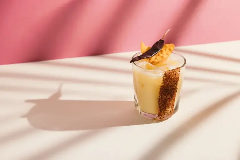 Cocktail with pink wall shadows