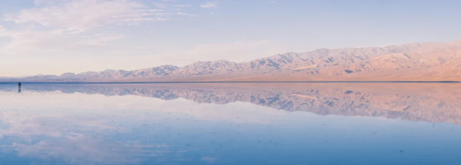Panorama of the Panamint Range mirrored in the flooded Lake Manly, Badwater Basin, Death Valley
